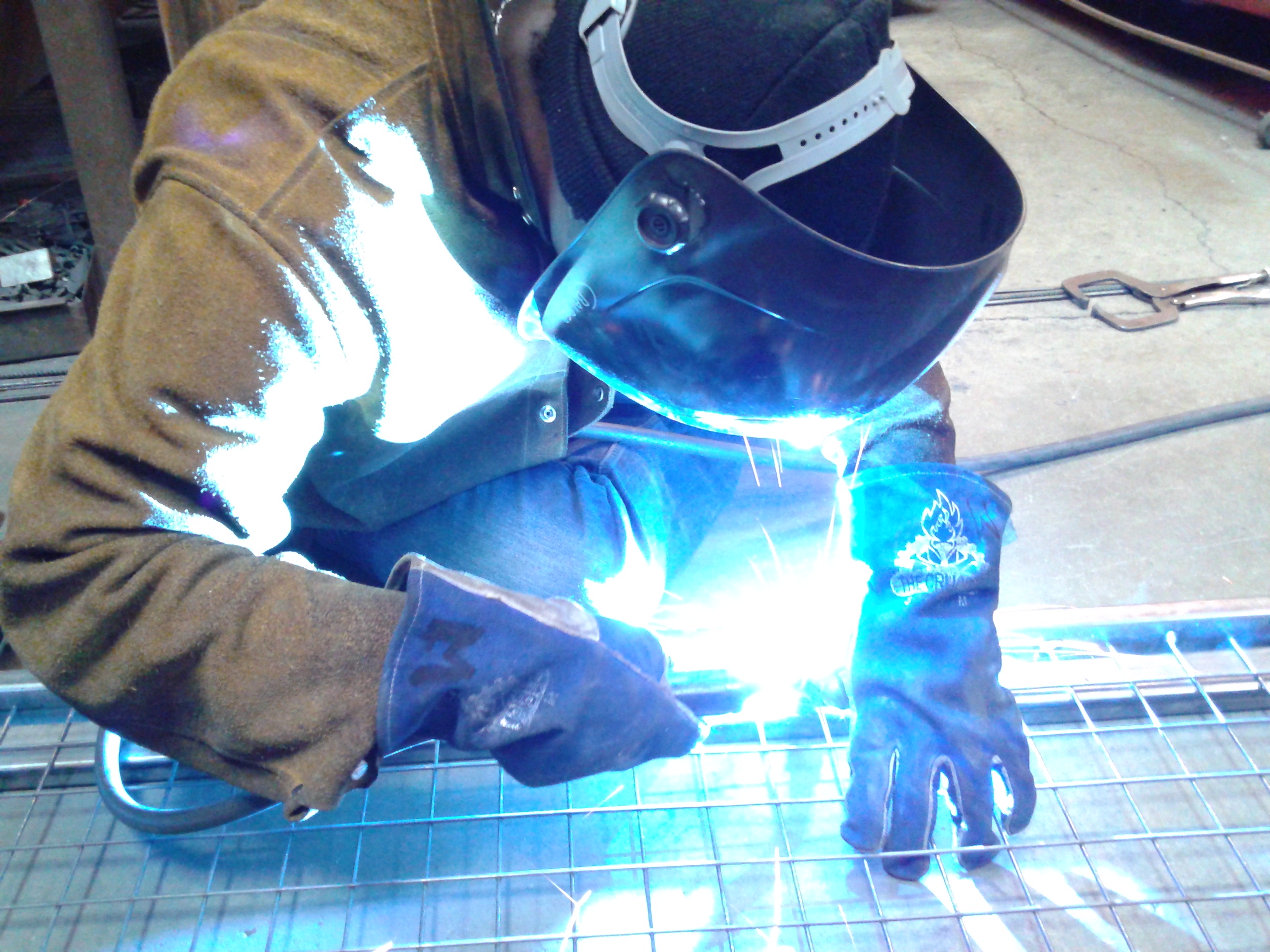 Crucible Apprentice forging gate for the West Oakland Urban Farm and Park Crucible Apprentice forging gate for the West Oakland Urban Farm and Park