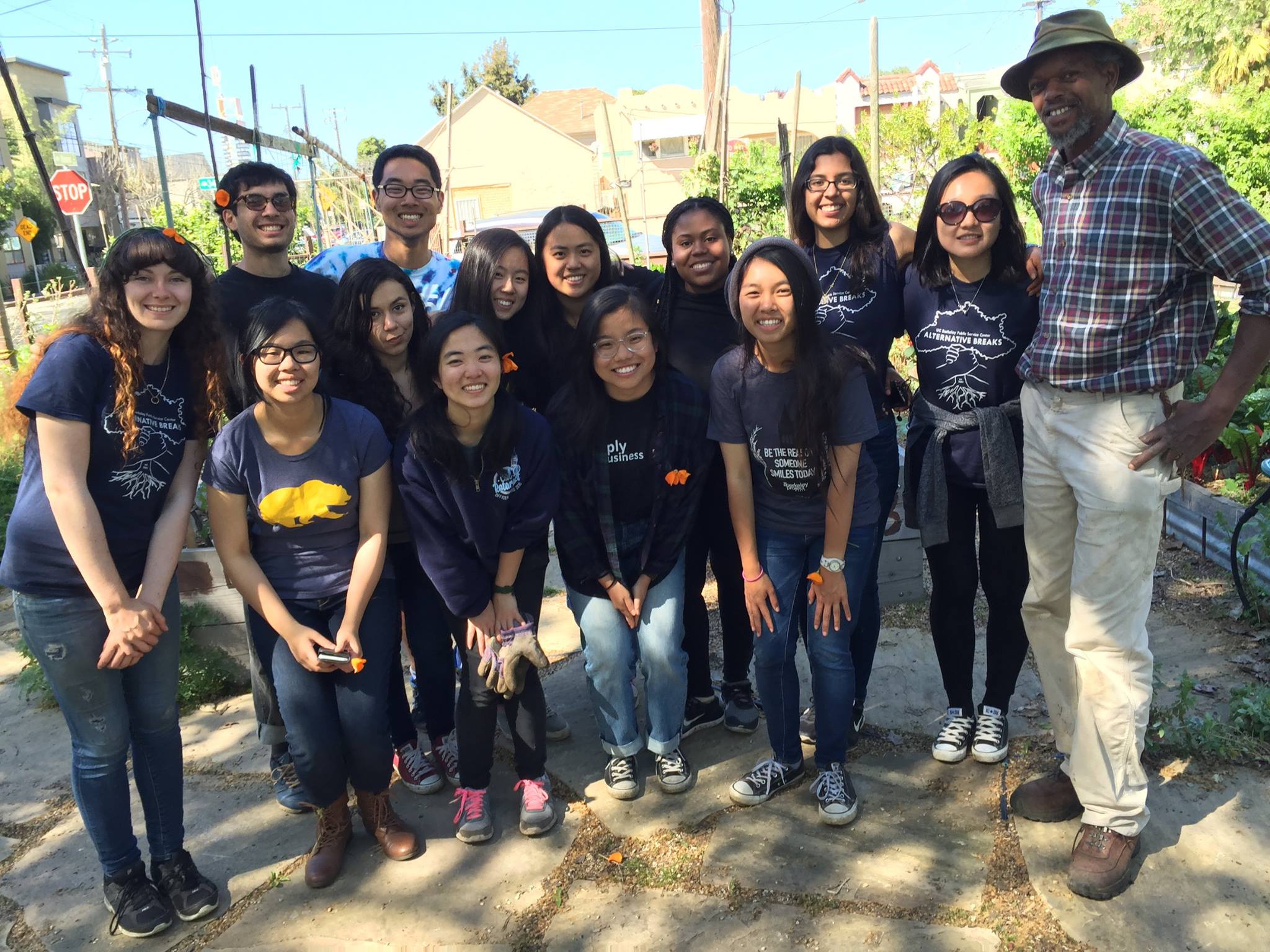 Andre Solis-Flores (top row, third from right) led a UC Berkeley Alternative Breaks group workday at City Slicker Farms, with Farm Manager Joseph Davis (far right). Andre Solis-Flores (top row, third from right) led a UC Berkeley Alternative Breaks group workday at City Slicker Farms, with Farm Manager Joseph Davis (far right).